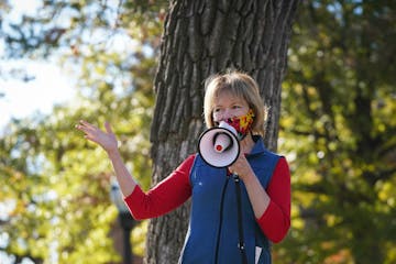 U.S. Senator Tina Smith and U.S. Congresswoman Ilhan Omar together prompted students on the University of Minnesota campus in Minneapolis to encourage