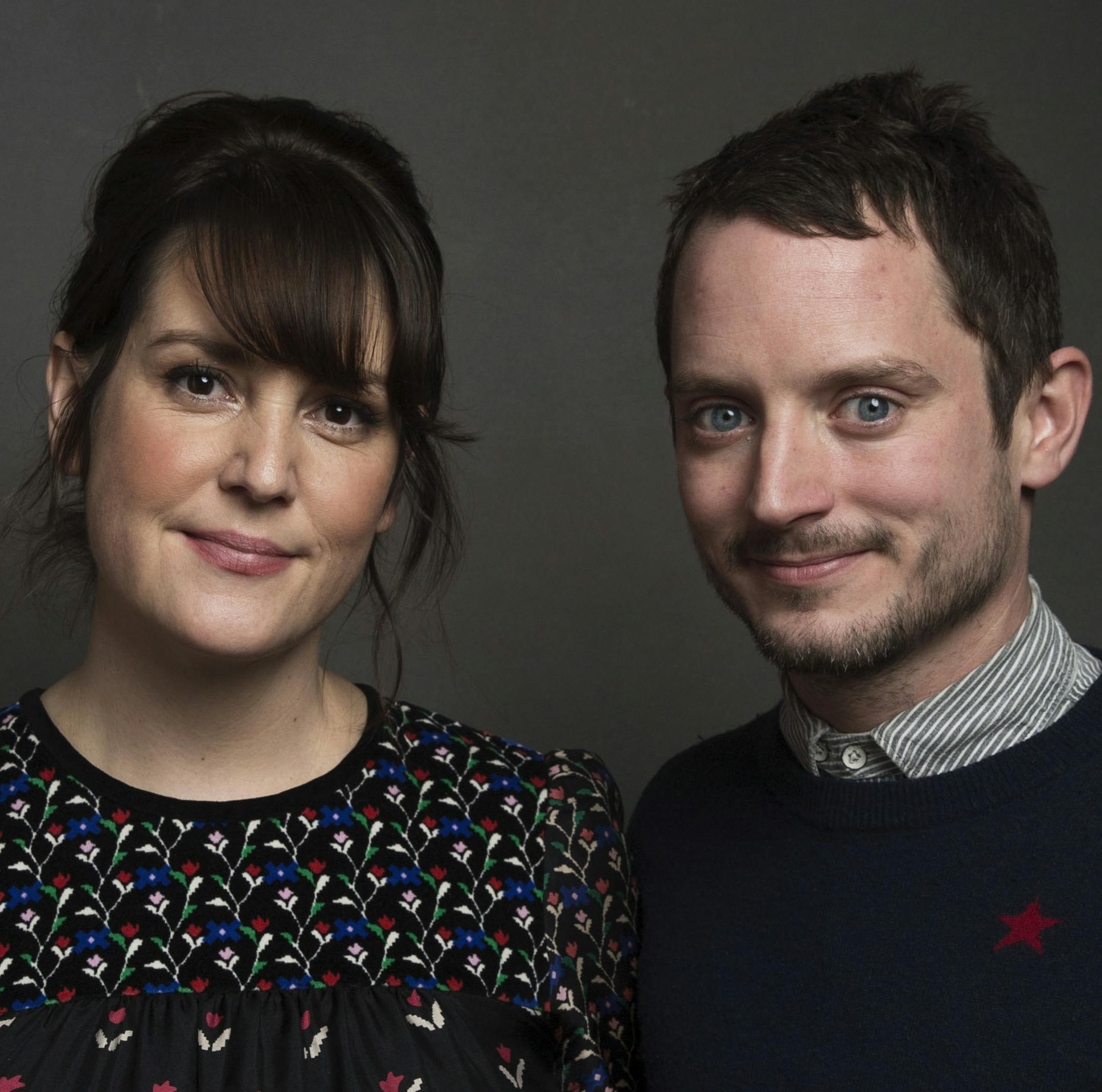 Actors Melanie Lynskey, left, and Elijah Wood pose for a portrait to promote the film, "I Don't Feel at Home in This World Anymore," at the Music Lodge during the Sundance Film Festival on Friday, Jan. 20, 2017, in Park City, Utah. (Photo by Taylor Jewell/Invision/AP)