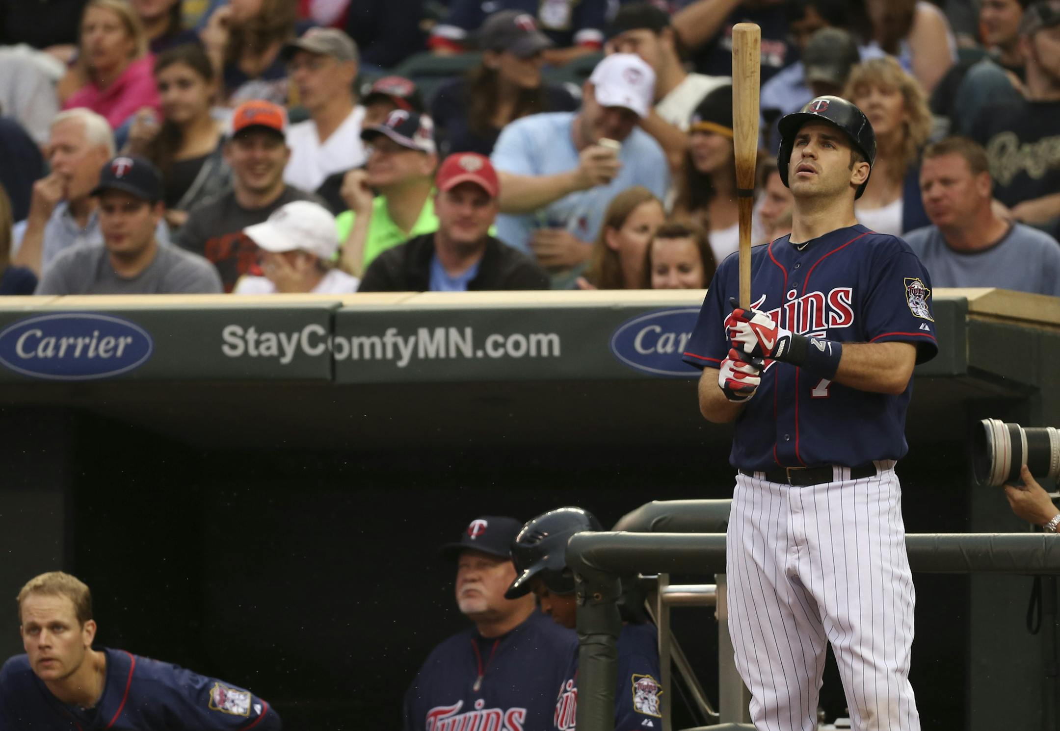 Joe Mauer batted third and played catcher in his first game back with the Twins after six games off.