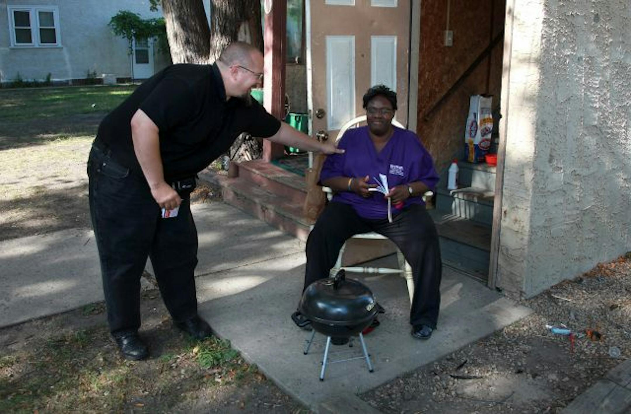 James Mullen is a former Ultimate Fighting Championship world champ who now runs a ministry in north Minneapolis through which he approaches drug dealers and hookers and tries to convert them. James stops to share the word and say hello to one of his neighbors, Mrs. Owens