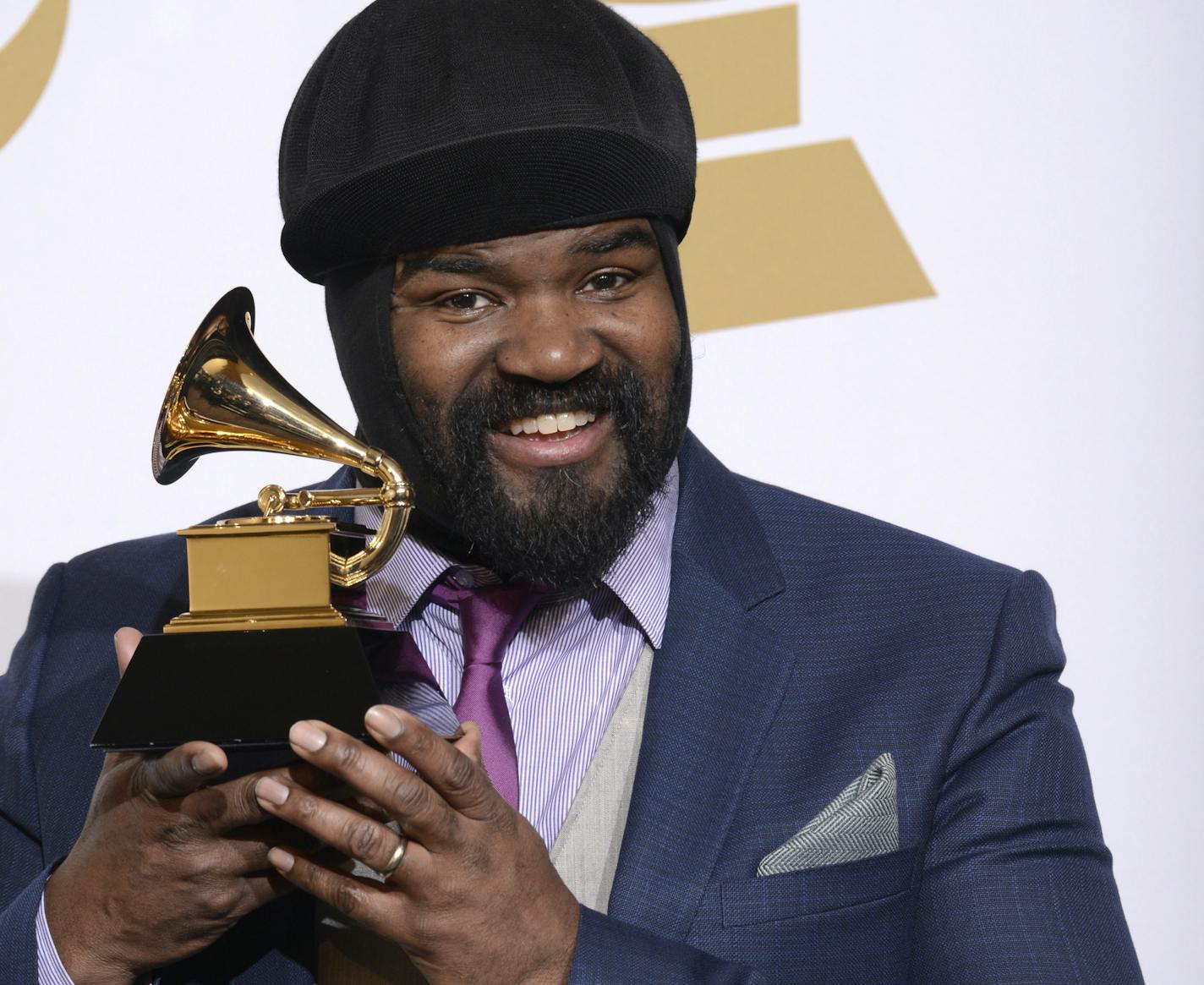 Gregory Porter poses in the press room with the award for best jazz vocal album for "Liquid Spirit" at the 56th annual GRAMMY Awards at Staples Center on Sunday, Jan. 26, 2014, in Los Angeles. (Photo by Dan Steinberg/Invision/AP)