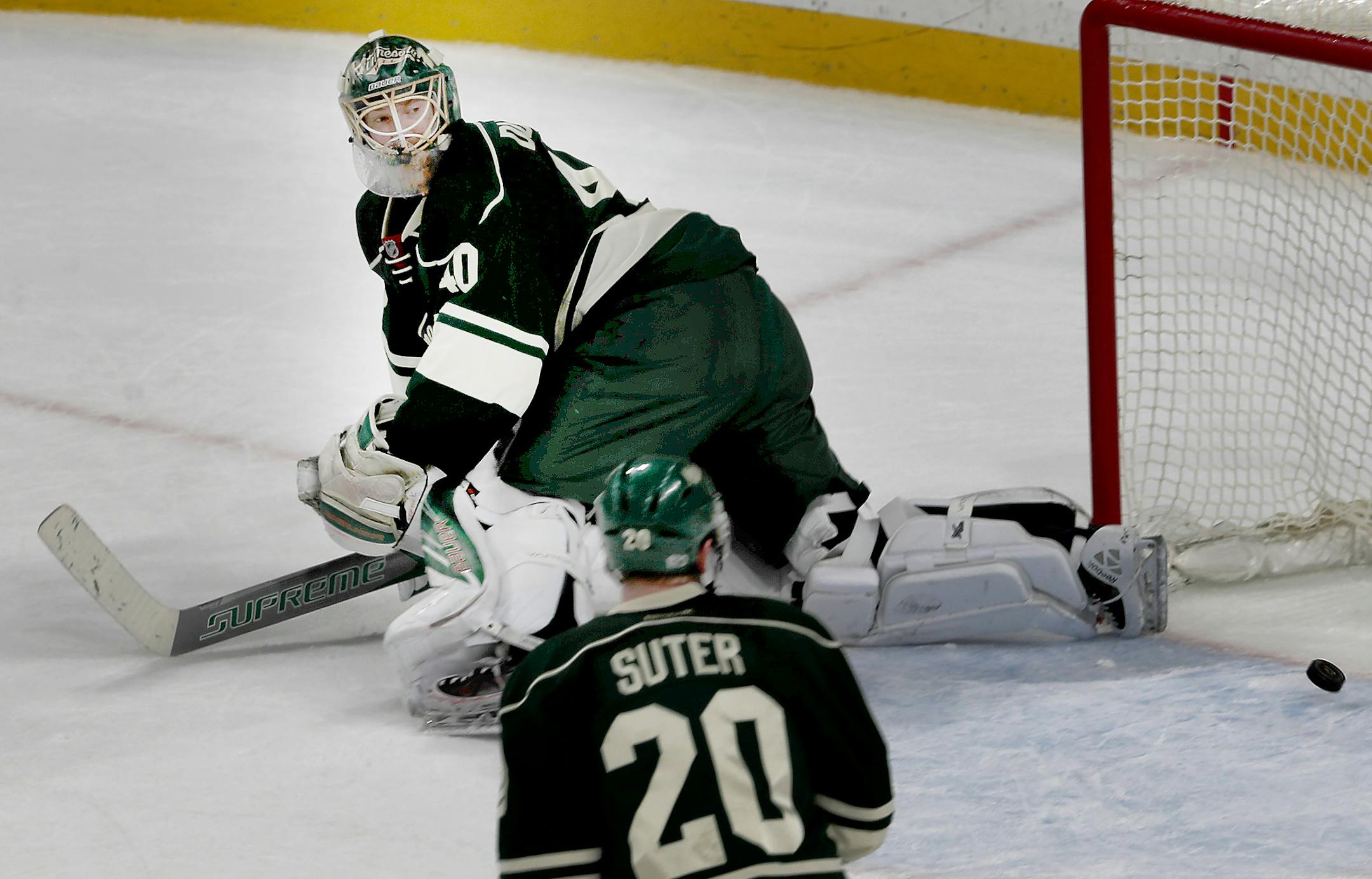 Wild goalie Devan Dubnyk and defenseman Ryan Suter could only watch the aftermath of T.J. Oshie's overtime winner.