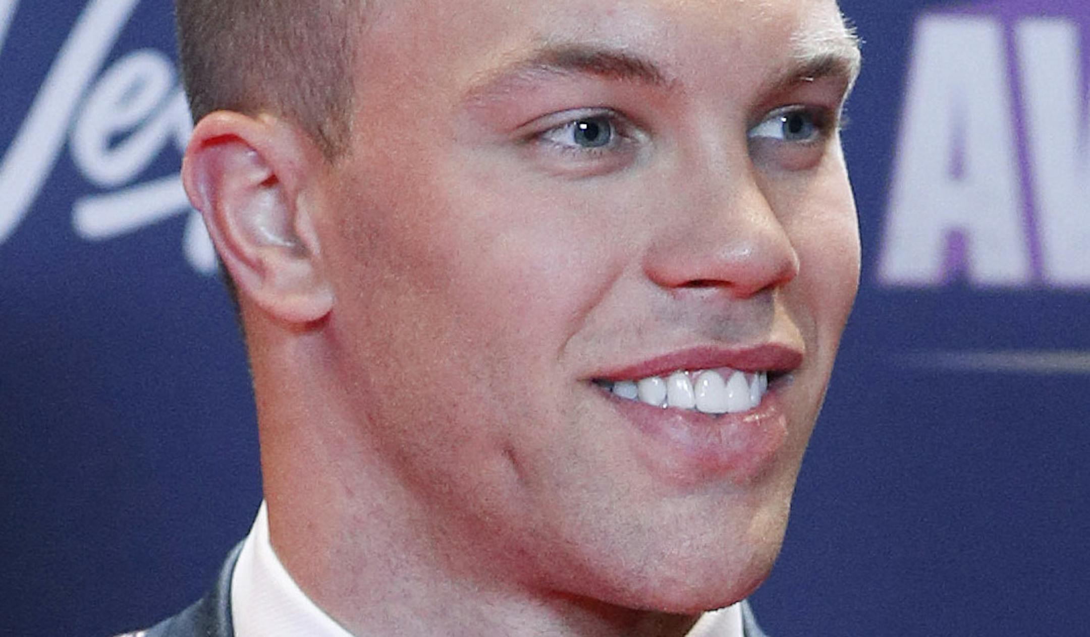 New Jersey Devils' Taylor Hall poses on the red carpet before the NHL Awards, Wednesday, June 20, 2018, in Las Vegas. (AP Photo/John Locher)