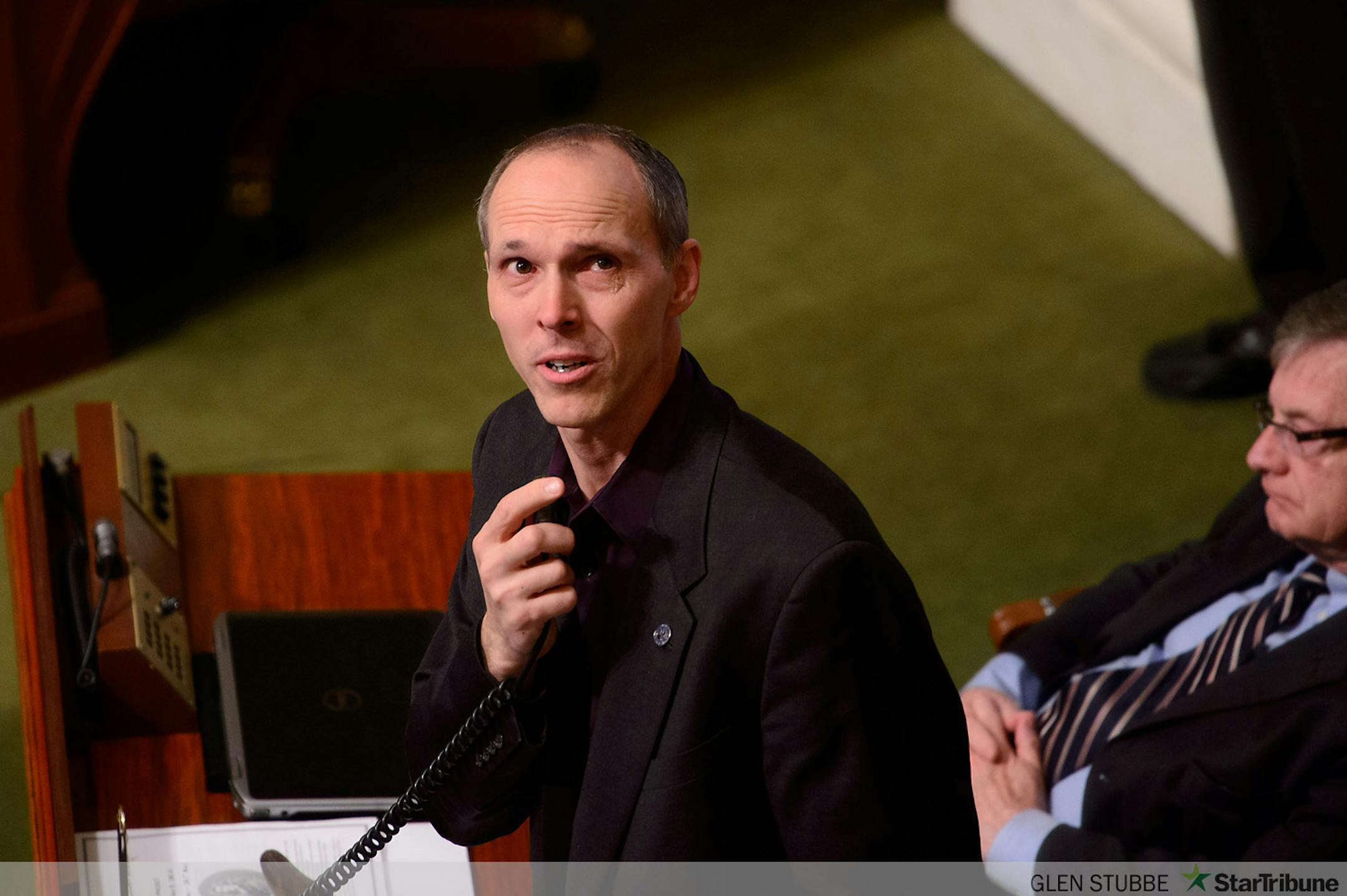 Rep. Rod Hamilton, R-Mountain Lake, looked up at families who are advocates for the bill.  He said he changed his mind and will vote yes for  this bill.  He has MS and could benefit from medical marijuana.    The House passed the medical marijuana bill by an overwhelmingly bipartisan vote of 86-39.    ]      Friday, May 9, 2014   GLEN STUBBE * gstubbe@startribune.com