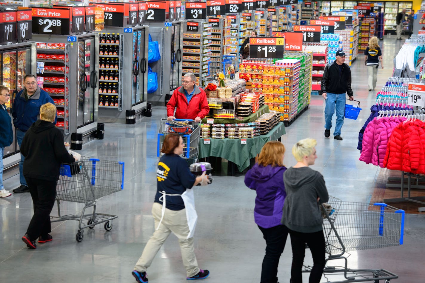 Customers shopped the aisles of the new Andover Walmart Wednesday, November 13, 2013 during its grand opening. ] GLEN STUBBE * gstubbe@startribune.com