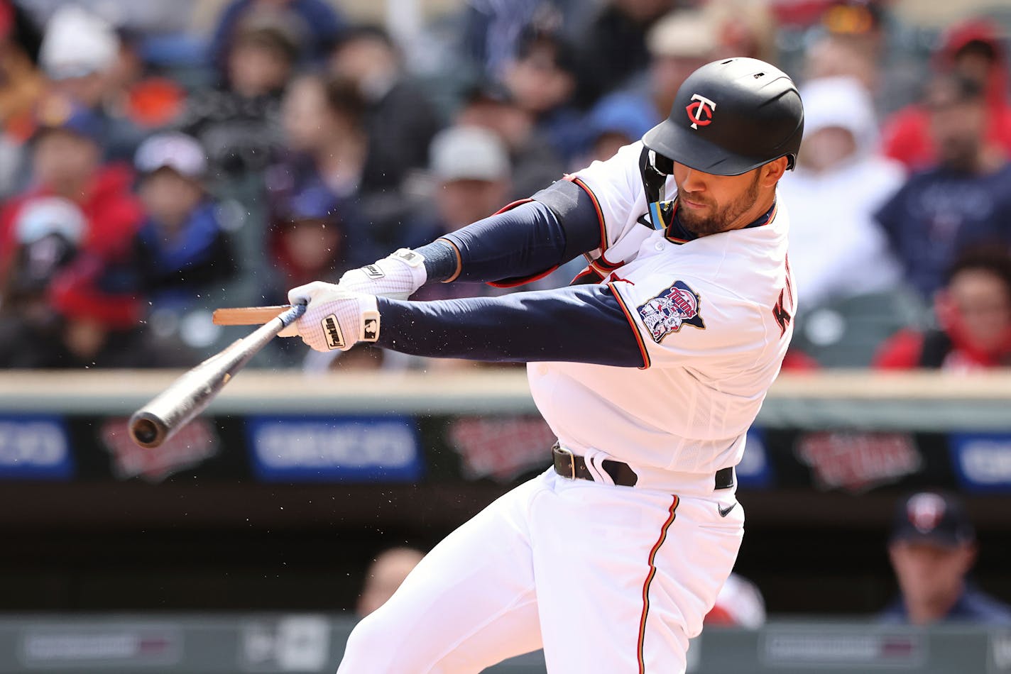 Minnesota Twins left fielder Alex Kirilloff (19) breaks a bat during the seventh inning of a baseball game against the Seattle Mariners, Saturday, April 9, 2022, in Minneapolis. Seattle won 4-3. (AP Photo/Stacy Bengs)