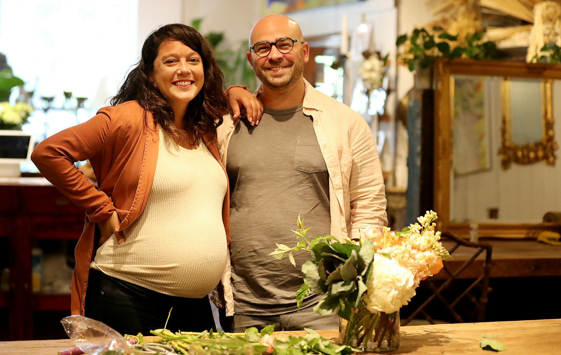 Liz Devlichevitch Mattingly at her business Lilia Flower Boutique with her husband Julian Devlichevitch Mattingly Wednesday, June 17, 2020, in Wayzata, MN.] DAVID JOLES • david.joles@startribune.com Liz Mattingly should have gotten her $20,000 PPP loan in April, when the government approved her deal with Wells Fargo. But two months later, Wells Fargo still hasn't released her funds. As a result, the Wayzata florist -- who is eight months pregnant - has been working 12 hour days to make up for th