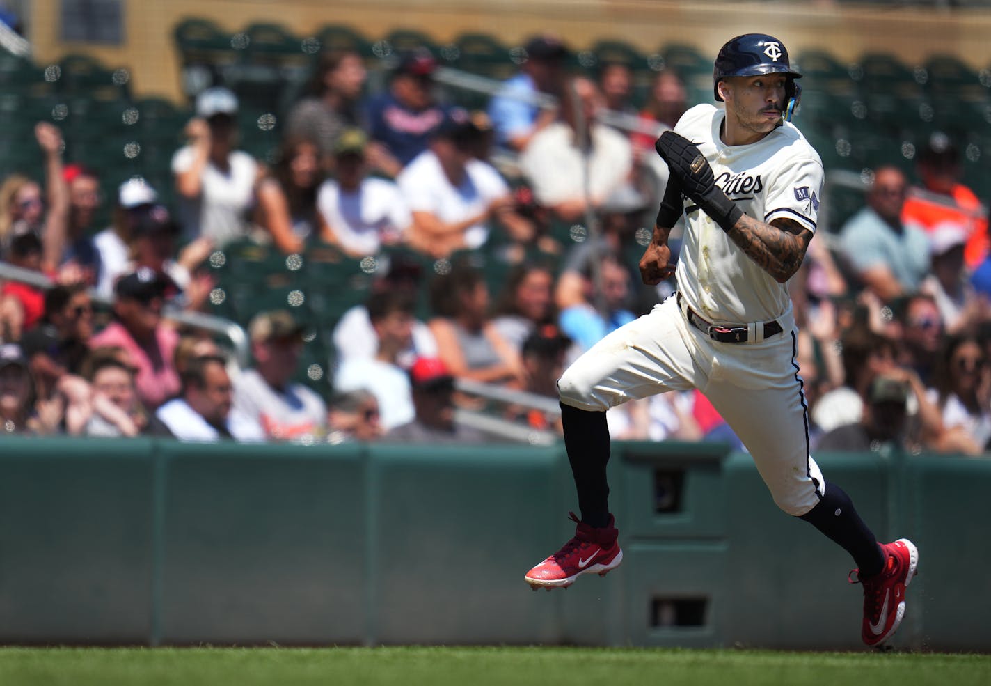 Minnesota Twins shortstop Carlos Correa (4) scores on a double from Minnesota Twins second baseman Edouard Julien (47) in the first inning in Minneapolis, Minn., on Sunday, July 9, 2023. Twins take on the Orioles at Target Field.] RICHARD TSONG-TAATARII • richard.tsong-taatarii @startribune.com