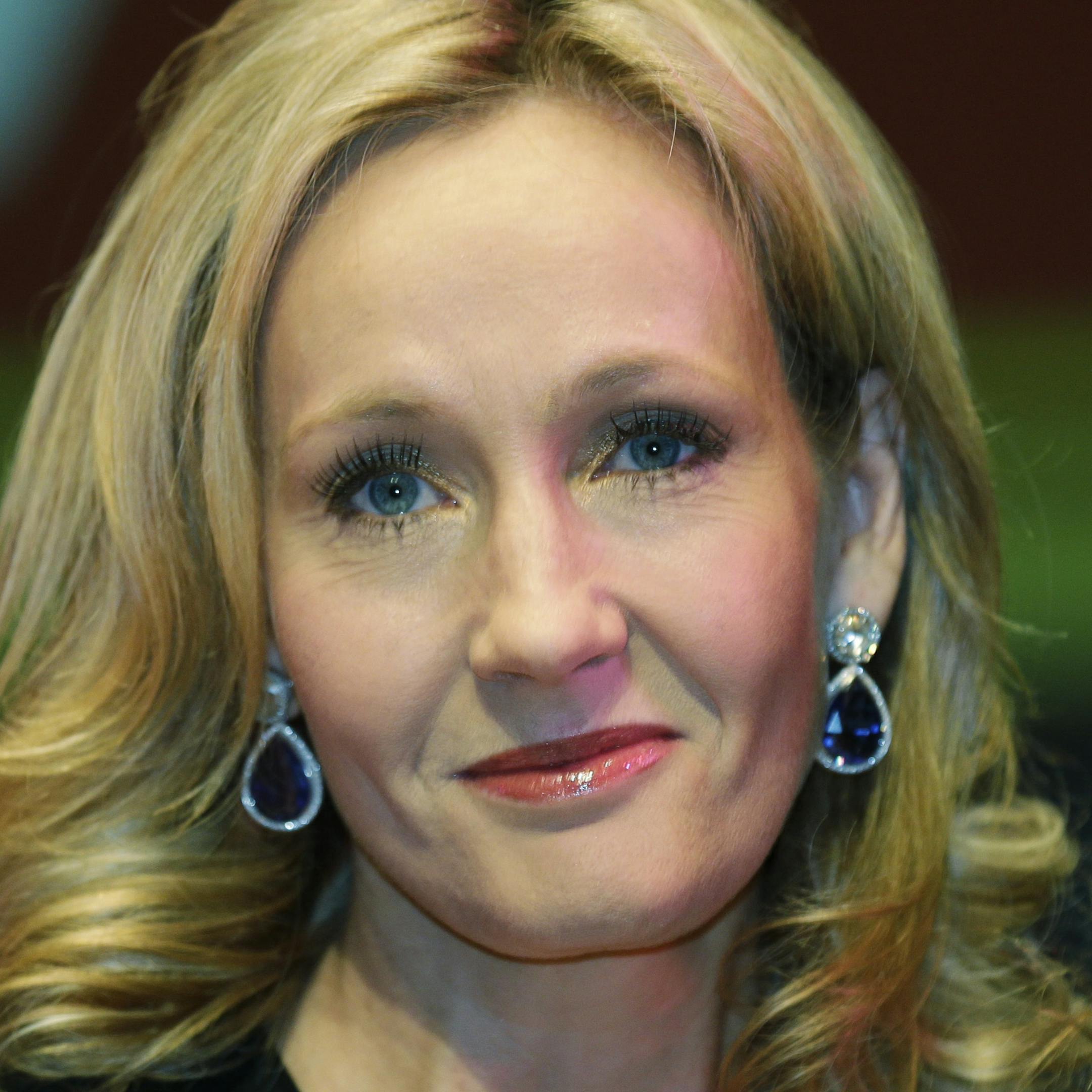 FILE- British author J.K. Rowling poses for photographers at the Southbank Centre in London, in this file photo dated Thursday, Sept. 27, 2012. Author of the Harry Potter series of books, J.K. Rowling is having second thoughts about the romantic content for the characters in her Potter books, in an interview published Sunday Feb. 2, 2014, Rowling reveals she chose the relationships for very personal reasons, "as a form of wish fulfillment", and having little to do with literature. (AP Photo/Left