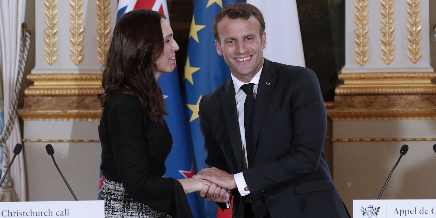 New Zealand Prime Minister Jacinda Ardern, left, and French President Emmanuel Macron, shake hands after a press conference at the Elysee Palace, in Paris, Wednesday, May 15, 2019. World leaders and tech bosses meet Wednesday in Paris to discuss ways to prevent social media from spreading deadly ideas. (Yoan Valat/Pool Photo via AP)