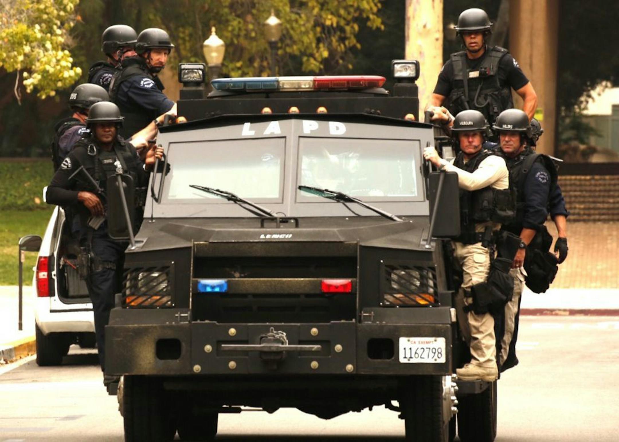 Police use armored vehicles to search and secure several buildings on the north end of the UCLA campus on Wednesday, June 1, 2016.