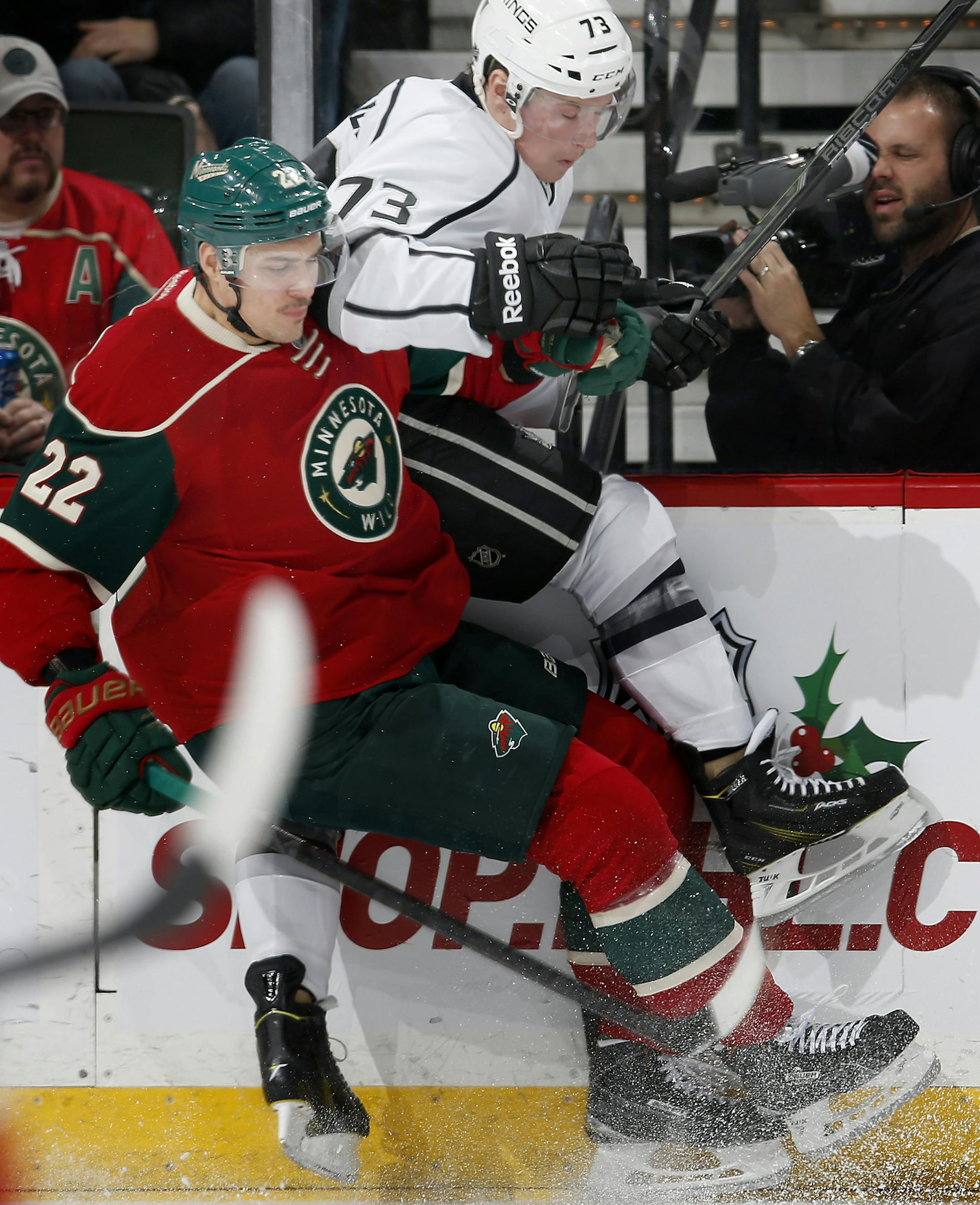 Nino Niederreiter (22) and Tyler Toffoli (73) collided in the second period. ] CARLOS GONZALEZ cgonzalez@startribune.com - November 26, 2014, St. Paul, Minn., Xcel Energy Center, NHL, Minnesota Wild vs. (LA) Los Angeles Kings