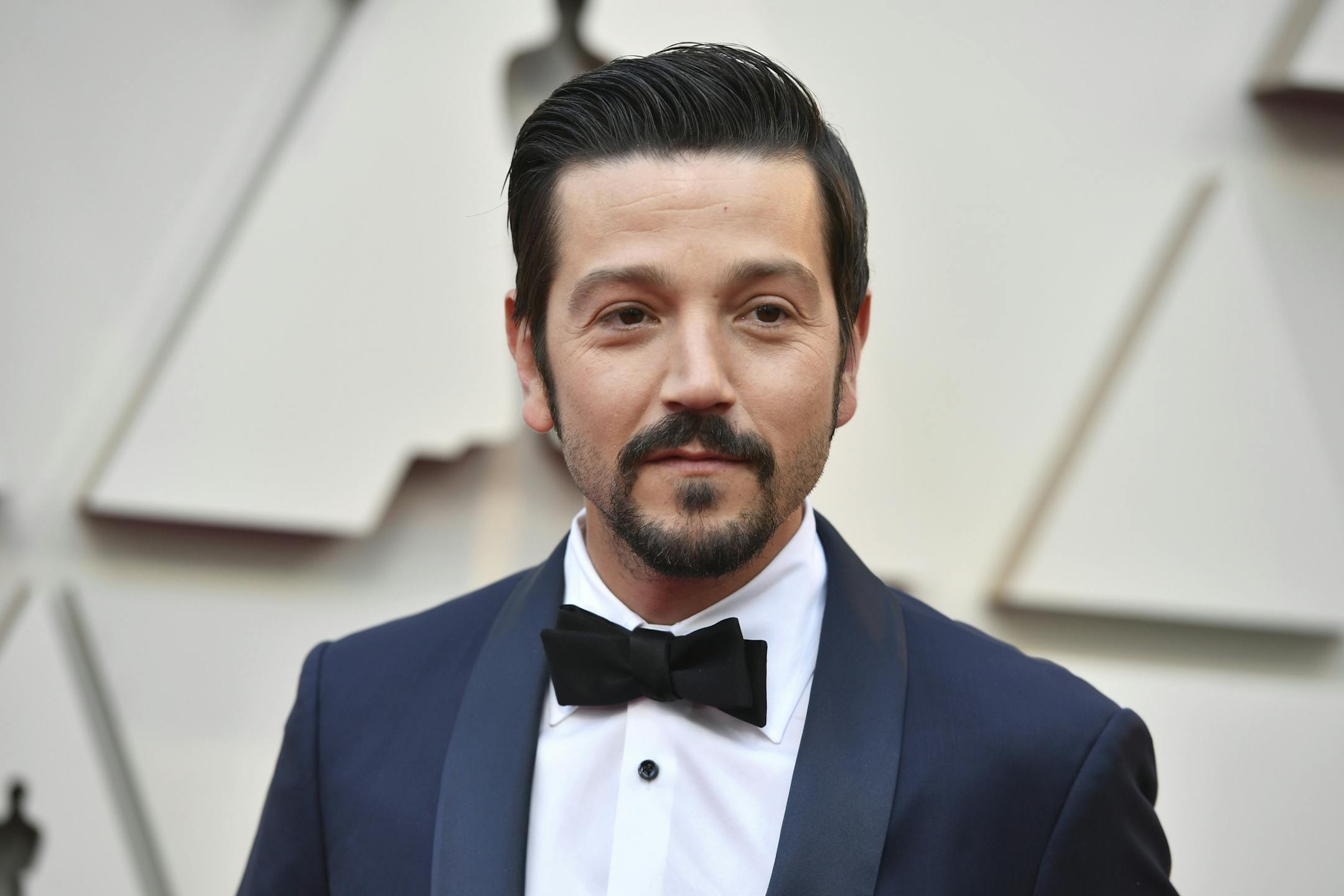 Diego Luna arrives at the Oscars on Sunday, Feb. 24, 2019, at the Dolby Theatre in Los Angeles.