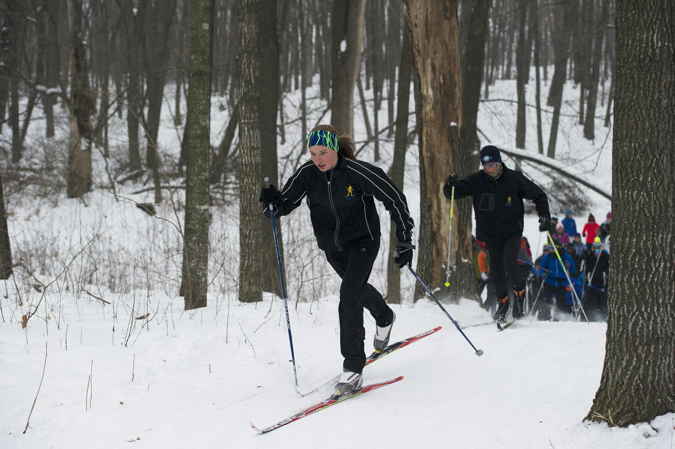 Anna French digs practices with the Wayzata girls cross country ski team Friday afternoon. ](Matthew Hintz, 010414, Wayzata)