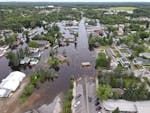 The northeastern Minnesota city of Cook is under water Thursday after nearby Little Fork River crested following 5 inches of rain. In nearby Ely, abou