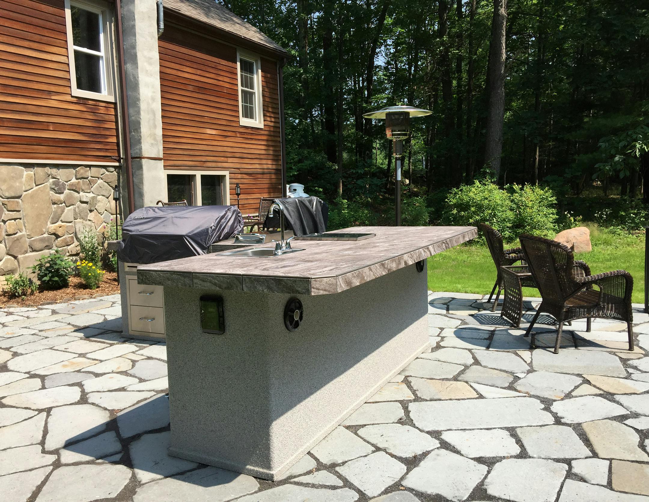 A newly installed outdoor kitchen just in time for summer. (Handout/TNS) ORG XMIT: 1185976