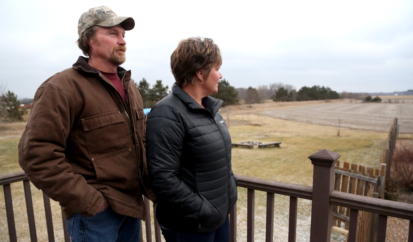 Rick and Cheryl Ramberg looked out at where solar panels will be. ] (KYNDELL HARKNESS/STAR TRIBUNE) kyndell.harkness@startribune.com The Ramburg/Carpenter houses will be surrounded by solar panels a a power plant in North Branch, Min., Thursday December 17, 2015.