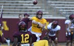 Gophers quarterback Tanner Morgan (2) passed the ball during practice Saturday.
