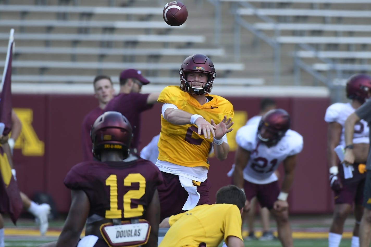 Gophers quarterback Tanner Morgan (2) passed the ball during practice Saturday.