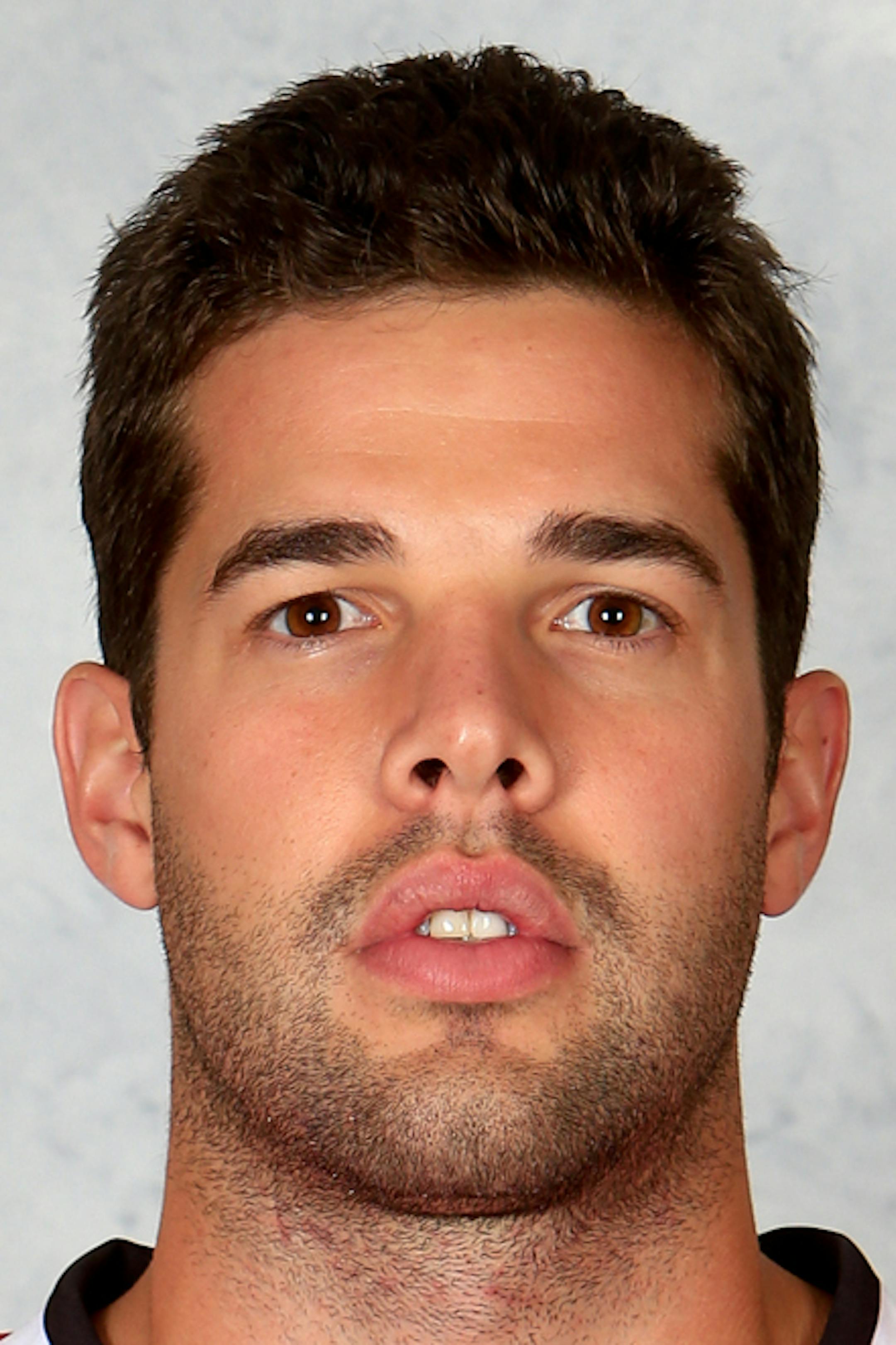 CHICAGO, IL ‚Äì September 11: Corey Crawford #50 of the Chicago Blackhawks poses for his official headshot for the 2013-2014 season on January 13, 2013 at the United Center in Chicago, Illinois. (Photo by Chase Agnello-Dean/NHLI via Getty Images)*** Local Caption *** Corey Crawford ORG XMIT: 177614218