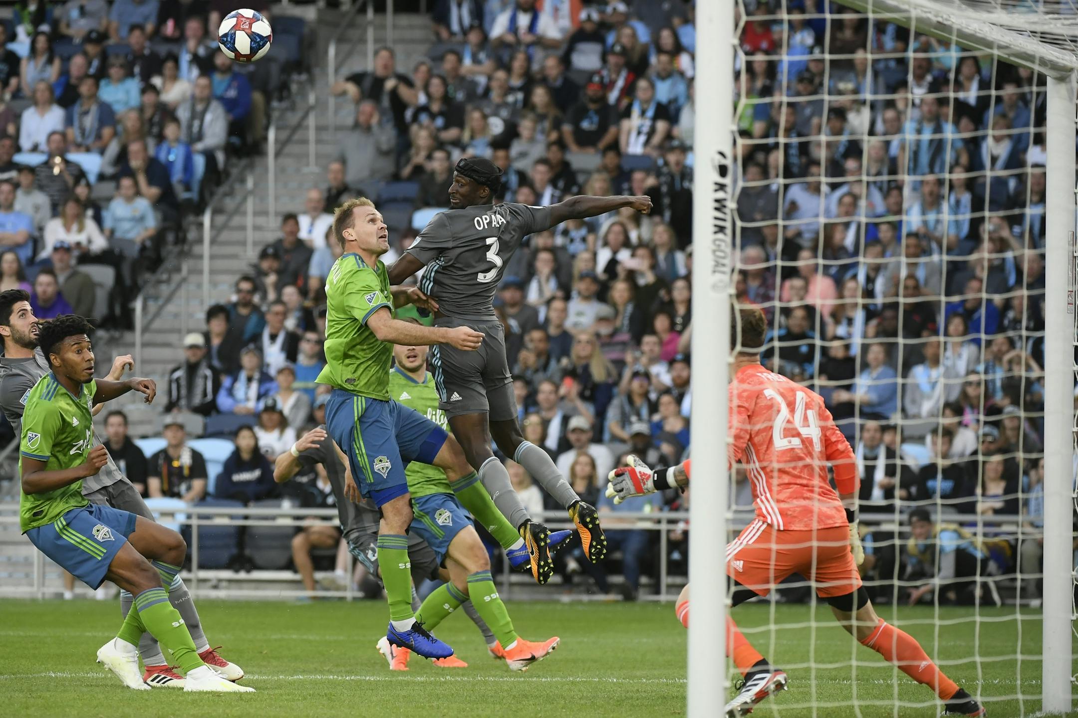 Minnesota United defender Ike Opara (3) scored a goal off a header as he collided with Seattle Sounders defender Chad Marshall (14) in the first half.