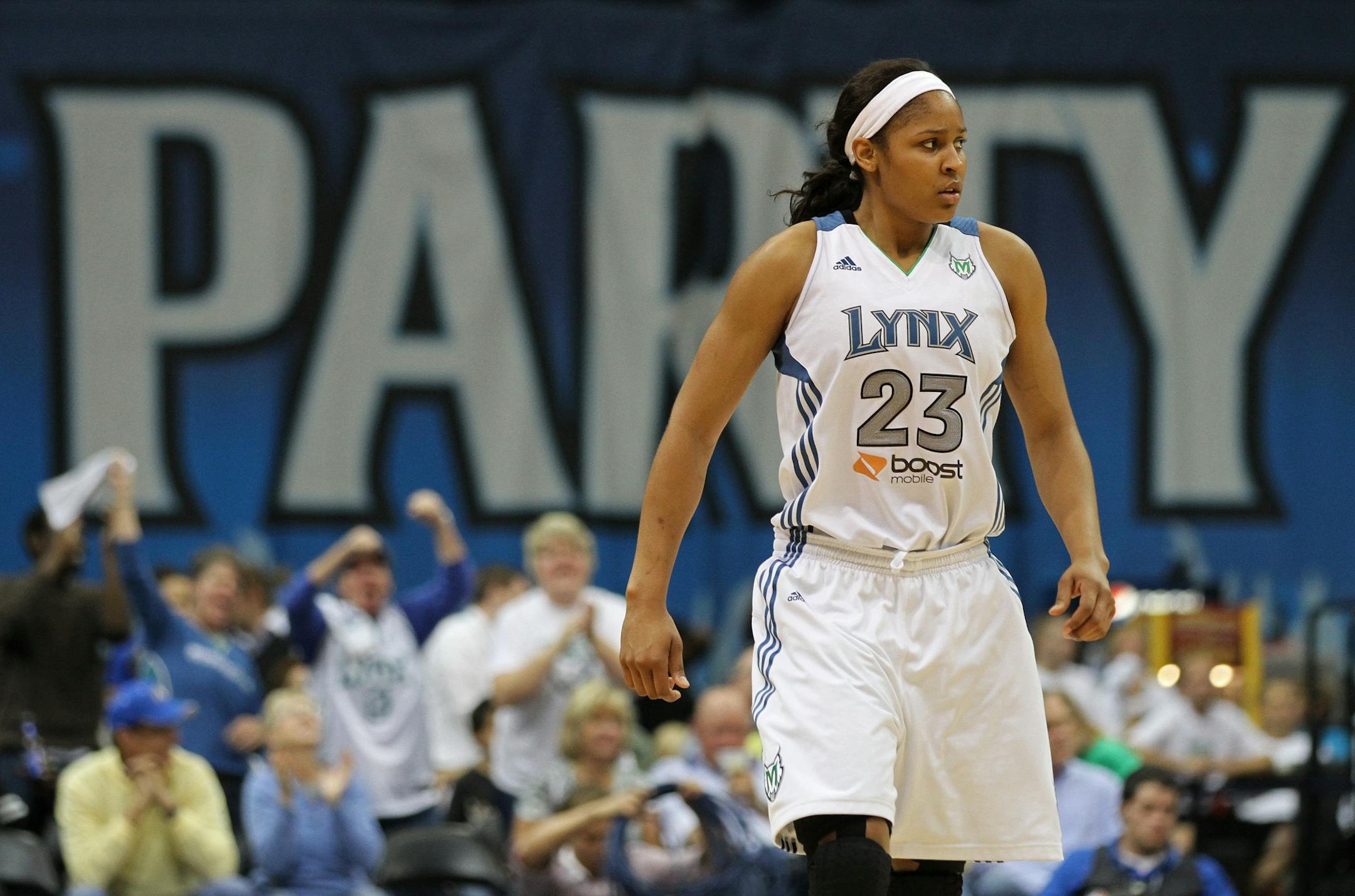 Maya Moore walks to center court after the shot clock expires on San Antonio with 4:23 left in the fourth quarter. Moore scored 10 points in the Minnesota Lynx playoff game against the San Antonio Silver Stars. The Lynx won the first game of the series 66-65.