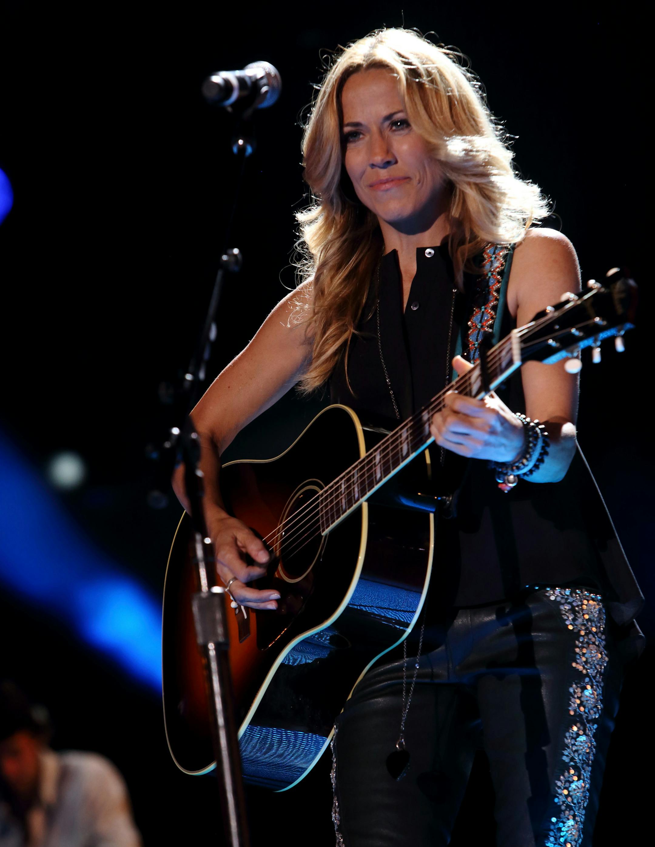 Sheryl Crow performs at LP Field on Friday June 7, 2013 in Nashville Tennessee.(Photo by John Davisson/Invision/AP) ORG XMIT: INVW ORG XMIT: MIN1309301431115486
