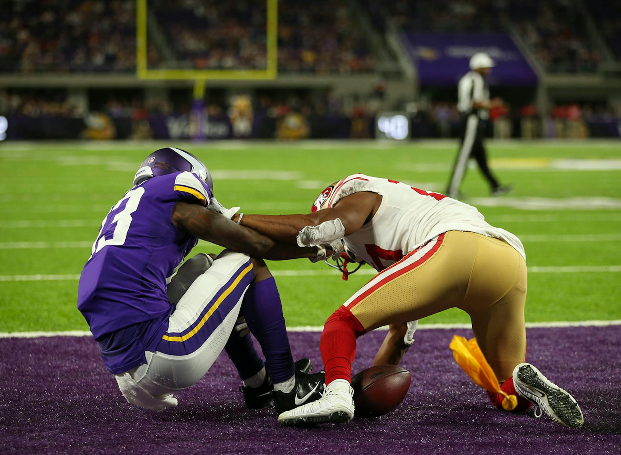 San Francisco 49ers cornerback Keith Reaser (27) was called for pass interference while defending Minnesota Vikings wide receiver Stacy Coley (13) in the end zone in the fourth quarter.