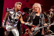 Queen + Adam Lambert (whose at left, with Brian May) return for two nights in St. Paul.