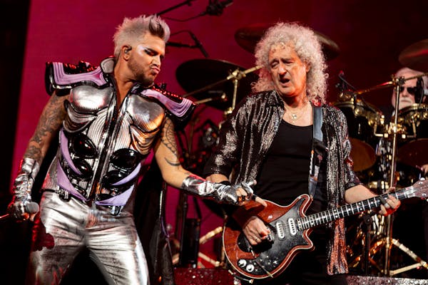 Queen + Adam Lambert (whose at left, with Brian May) return for two nights in St. Paul.