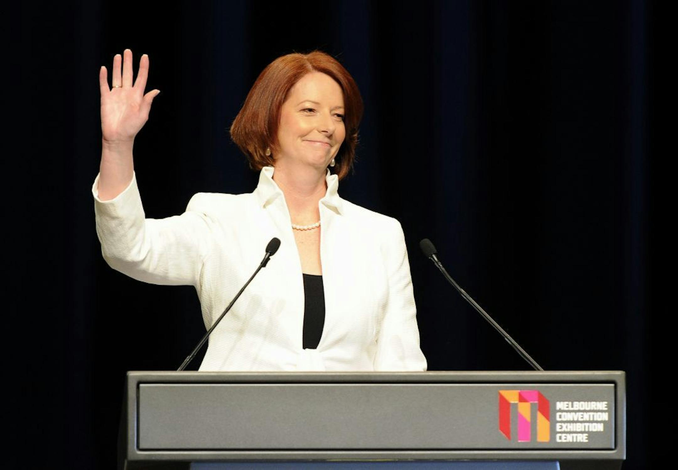 Australian Prime Minister Julia Gillard, leader of the Australian Labor Party waves to the crowd during her post election speech in Melbourne, Saturday, Aug. 21, 2010.