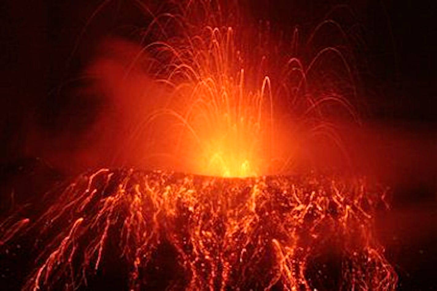 The Tungurahua Volcano spews ash and stones during an eruption as seen from Cotalo, Ecuador, Friday, April 29, 2011. The volcano, 136 kilometers, some 85 miles, southeast of Quito, has been active since 1999. (AP Photo/Dolores Ochoa)