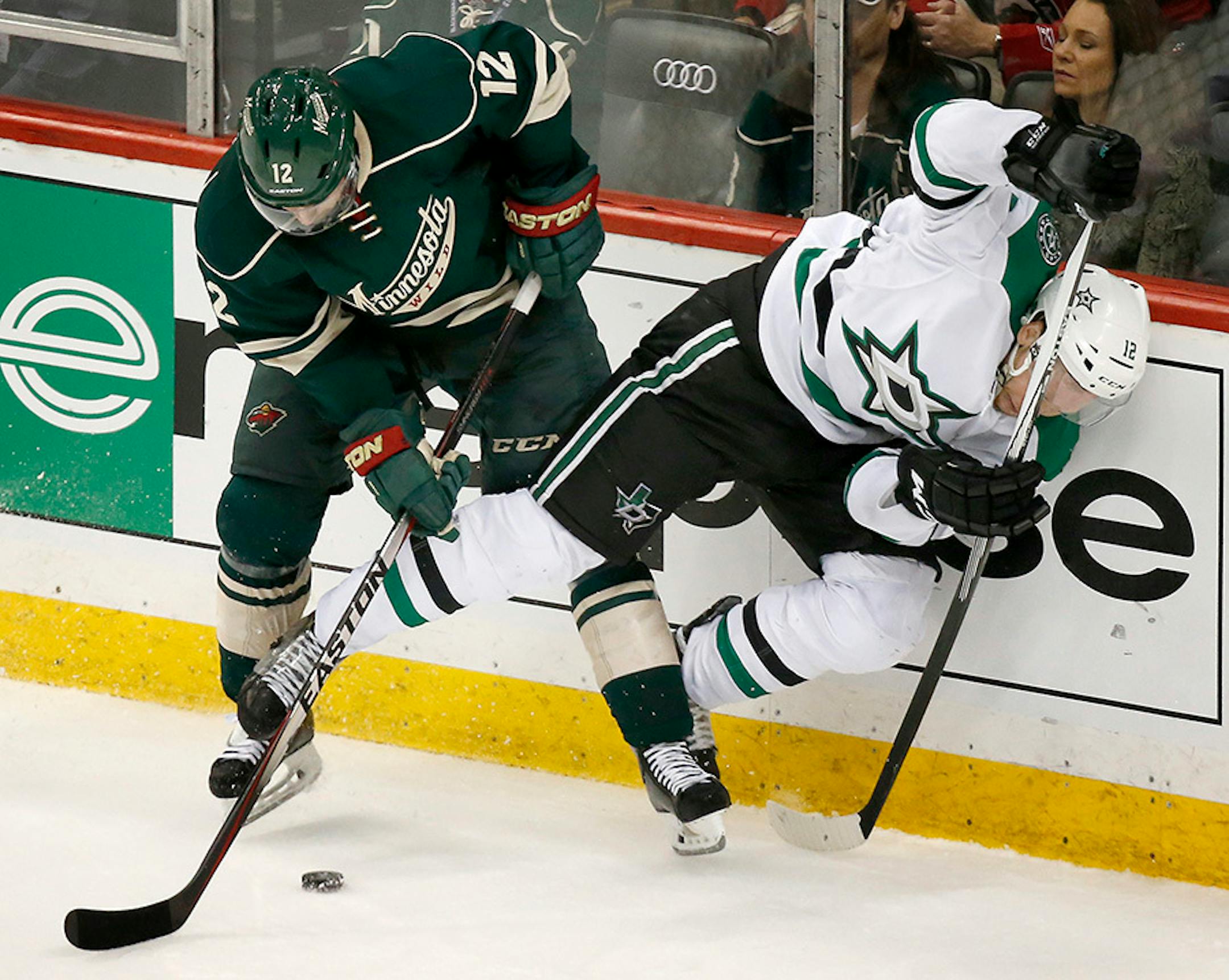 David Jones (12) and Radek Faksa (12) fought for the puck in the third period.