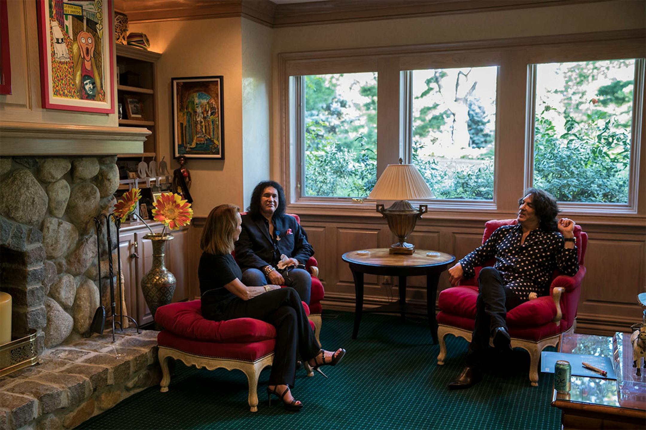 Kiss' Gene Simmons and Paul Stanley chatted with Vicki Escarra, CEO of Opportunity International, before a charity concert at the home of local philanthropist Martha "Muffy" MacMillan on Tuesday, August 2, 2016, in Long Lake, Minn.