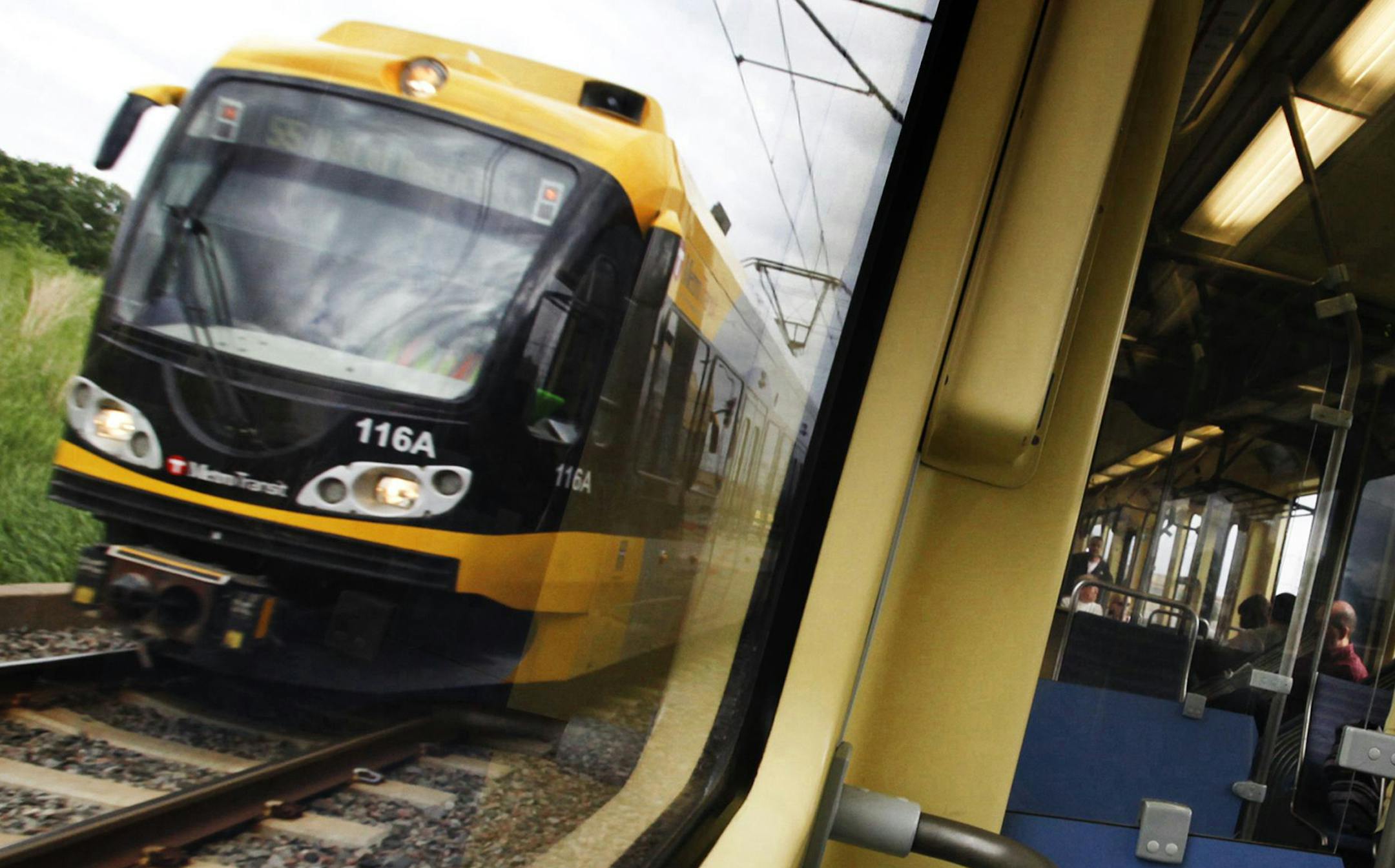 DAVID JOLES ï djoles@startribune.com -June 2, 2011- Minneapolis, MN- In this photo:] Riders take the light-rail during morning rush hour. Once derided as a ìtrain to nowhere," the Hiawatha light-rail line carries enough riders over 12 miles that it's cheaper to run than city buses. The daily cost per passenger mile of operating the Hiawatha between Bloomington and downtown Minneapolis is nearly half that of metro buses throughout the Twin Cities, according to the federal government. Th