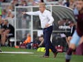 Minnesota United coach Adrian Heath directs the team against the Colorado Rapids during the first half of an MLS soccer match Wednesday, July 7, 2021,