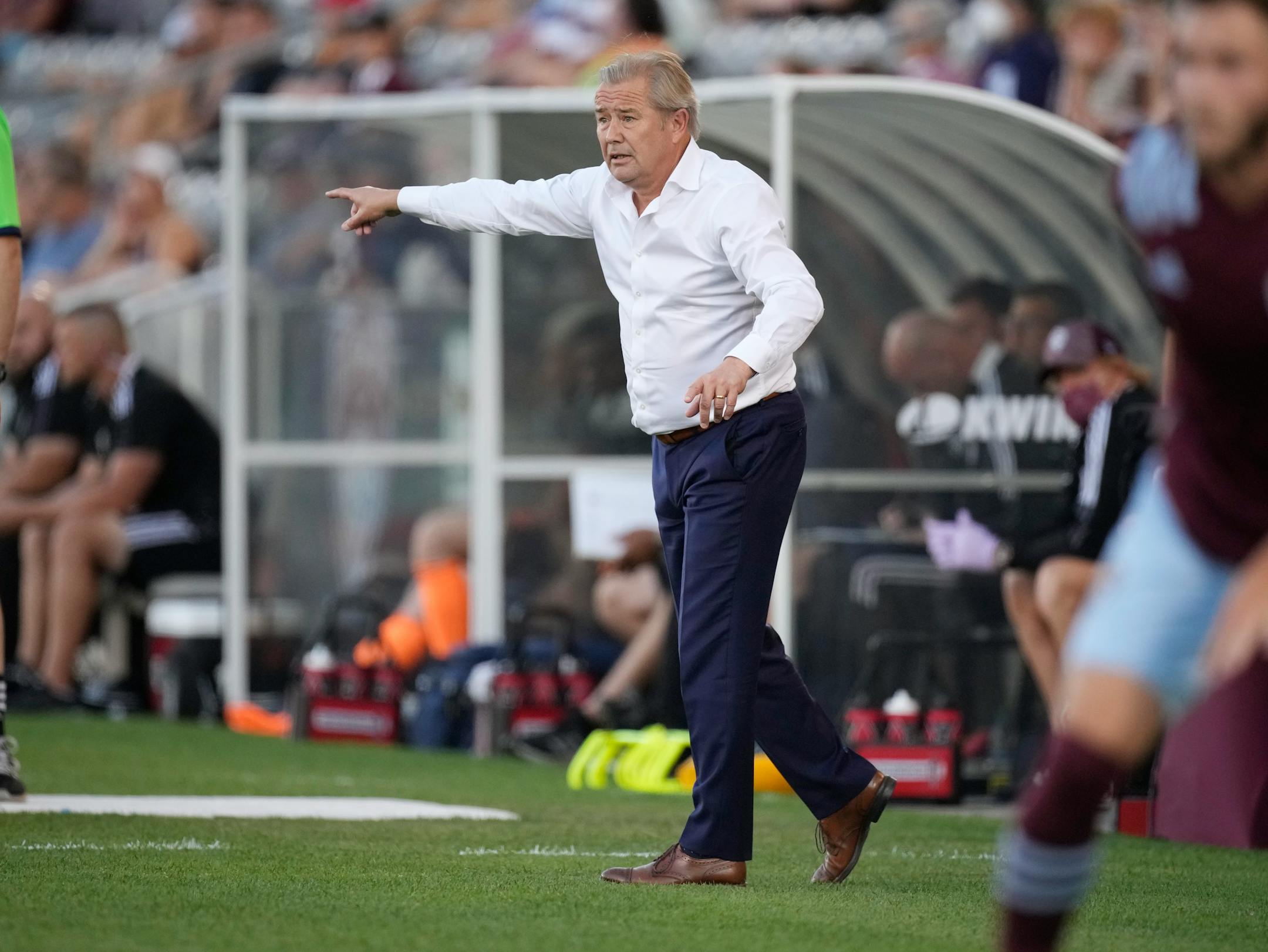 Minnesota United coach Adrian Heath directs the team against the Colorado Rapids during the first half of an MLS soccer match Wednesday, July 7, 2021, in Commerce City, Colo. (AP Photo/David Zalubowski)