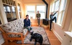 Hector Fernandez stood for a portrait with his wife, Celia Kohrman, their son Vincent, 11, and dog Zazou, in their front porch, which Hector converted