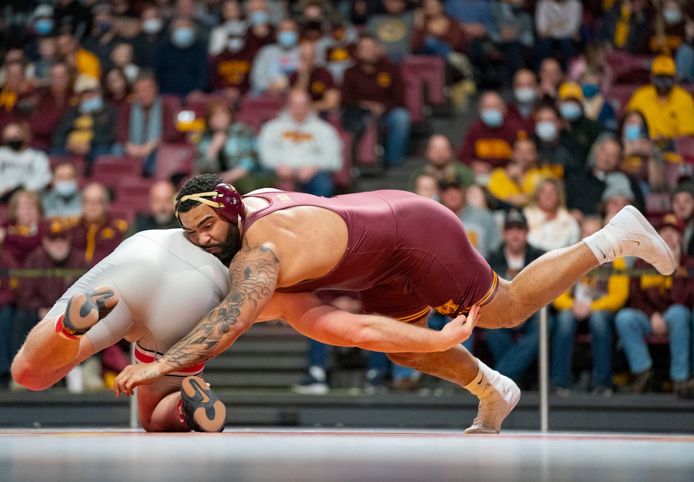 Gable Steveson wrestles in his final home meet against Tate Orndorff from Ohio State Friday, Feb. 11, 2022 at Maturi Pavilion in Minneapolis, Minn. He won his bout with a technical fall. Steveson is the nation's No. 1-ranked heavyweight and defending NCAA and Olympic champion. He rose to national fame when he won the gold medal in men's freestyle 125kg wrestling for Team USA in the 2020 Summer Olympics in Tokyo. ]