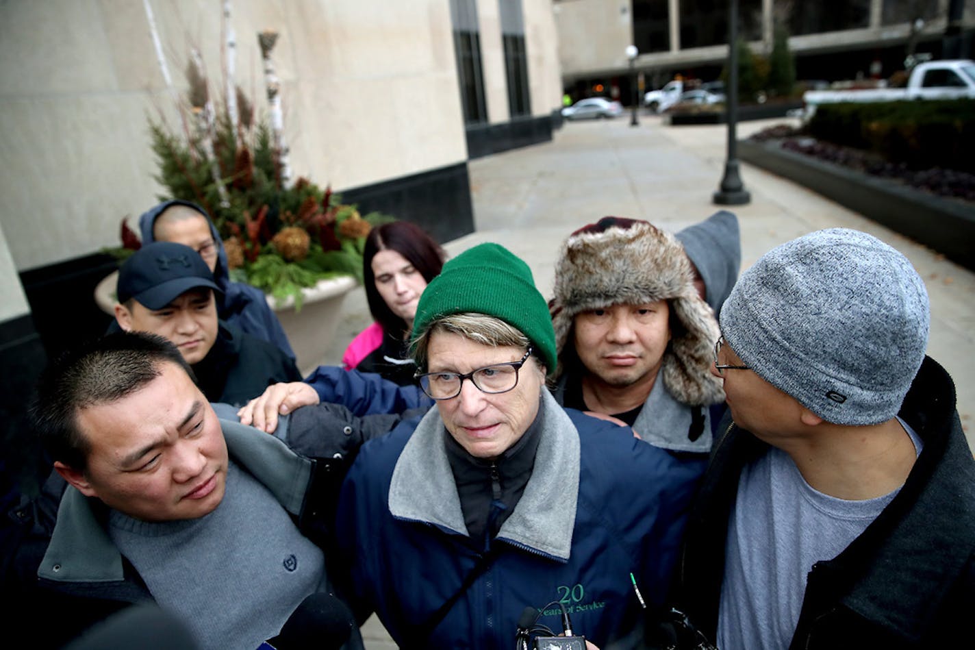 Cindy Majeske, who has worked in the shipping area at Water Gremlin for 28 years, was surrounded and embraced by co-workers as she spoke to the media regarding the the state's request for an injunction at a hearing in the Ramsey County District Court, Thursday, October 31, 2019 in St. Paul, MN.