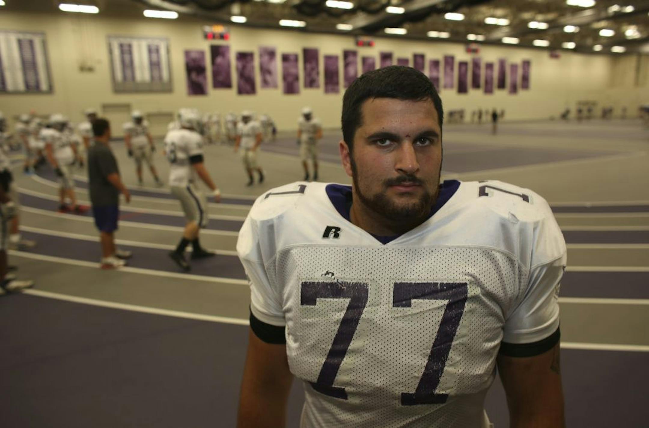 St. Thomas All-American center Curtis James stood in the indoor practice facility at St. Thomas University in St. Paul Min., Wednesday August 22, 2012. James also coaches speech at Edina High School.