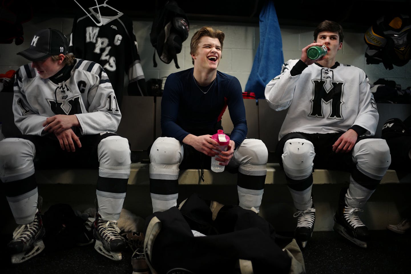 Sophomore hockey player Jake Hale, center, is a rare Division I-committed player from the Minneapolis public schools who didn't bolt for a private school.