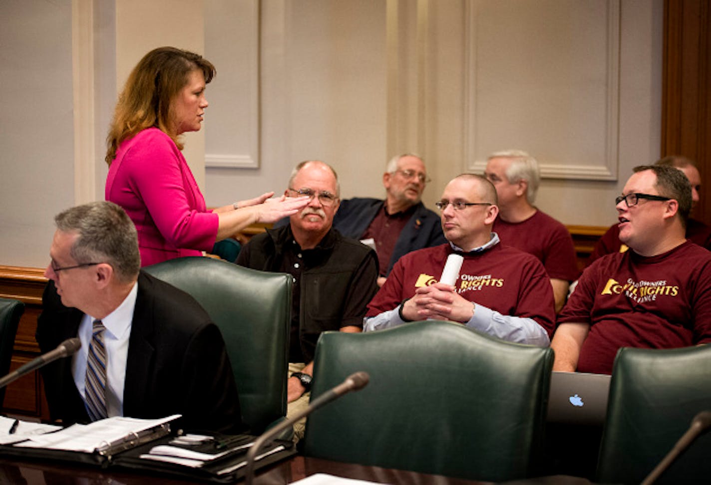 Sen. Michelle Benson talked with gun rights advocates before the start of Wednesday's hearing.  An advisory committee on Capitol Security began with two legislators, Rep. Michael Paymar and Sen. Michelle Benson not even knowing if they would be allowed to continue as members of the committee.   Wednesday, August 14, 2013   ]   GLEN STUBBE * gstubbe@startribune.com