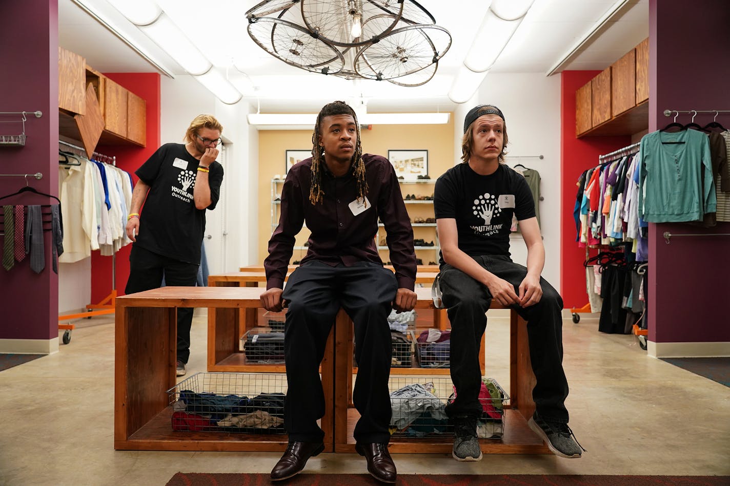 Outreach workers (from left) David Conyers, Derion Enge and Troy Murphy sat inside the food and clothing room during a tour of the renovated YouthLink facility in Minneapolis. ] Shari L. Gross &#xa5; shari.gross@startribune.com YouthLink, a Minneapolis nonprofit that helps homeless teens and young adults, is celebrating a major renovation after completing a $6 million fundraising campaign. The nonprofit opened in a dark, former jewelry factory 40 years ago and now, the latest renovation has made