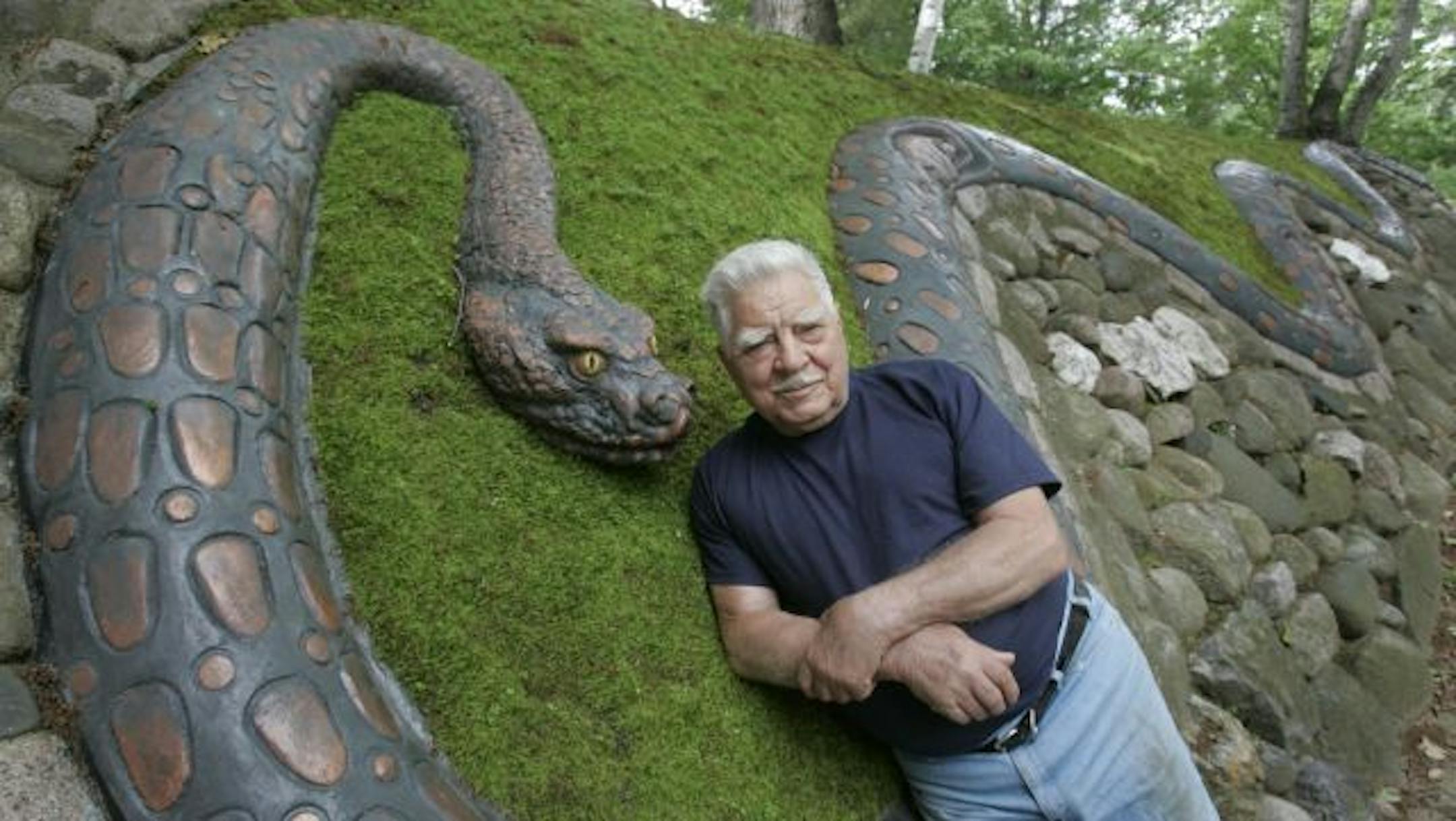 Sculptor and former Macalester College professor Anthony Caponi is seen with one of his creations at the Caponi Art Park and Learning Center in Eagan. He founded the park more than 30 years ago.
