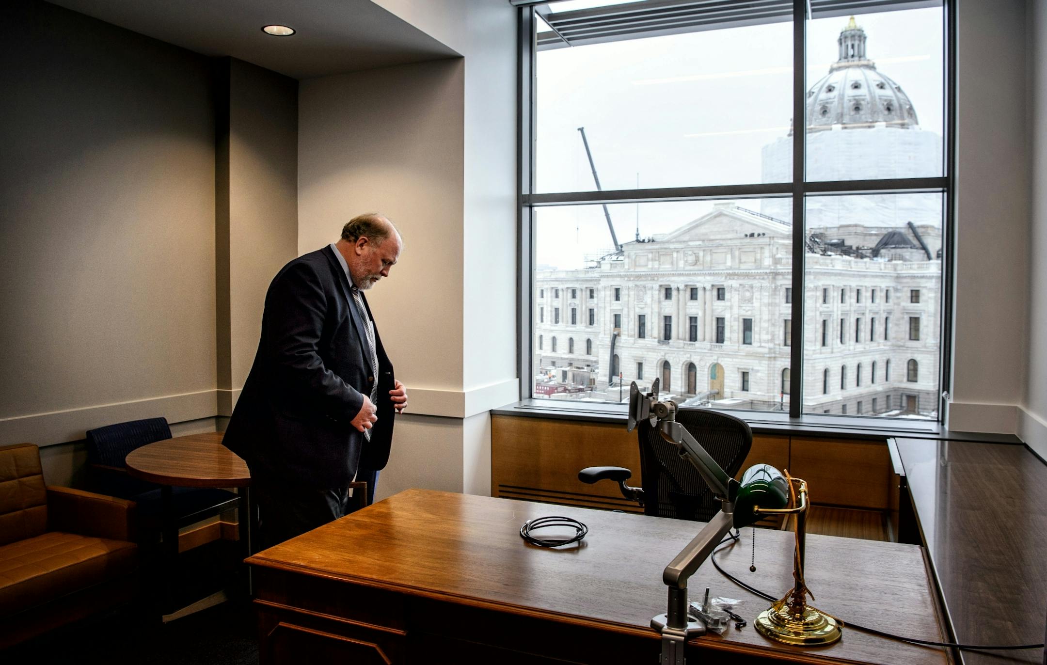 DFL Senator Lyle Koenen looked over his new office in the Senate Building. Republican senators refuse to use the new building.