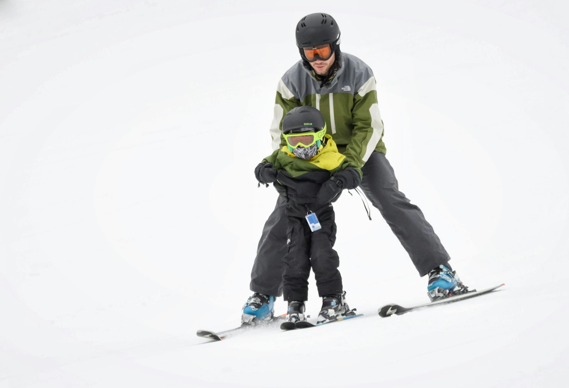 Shane Shipman suited up his youngest son Oliver, 5, and headed out to ski. Oliver was a bit timid but gained confidence with every run. He tumbled a few times but his dad stayed close and taught him how to get back on his skis. Skiers and boarders took to the slopes at Afton Alps in the first hours of the first day of Ski season. ] GLEN STUBBE • glen.stubbe@startribune.com Friday, November 10, 2017 Ski season has begun! Afton Alps opens today, Nov. 10. Open from 3-9:30 pm