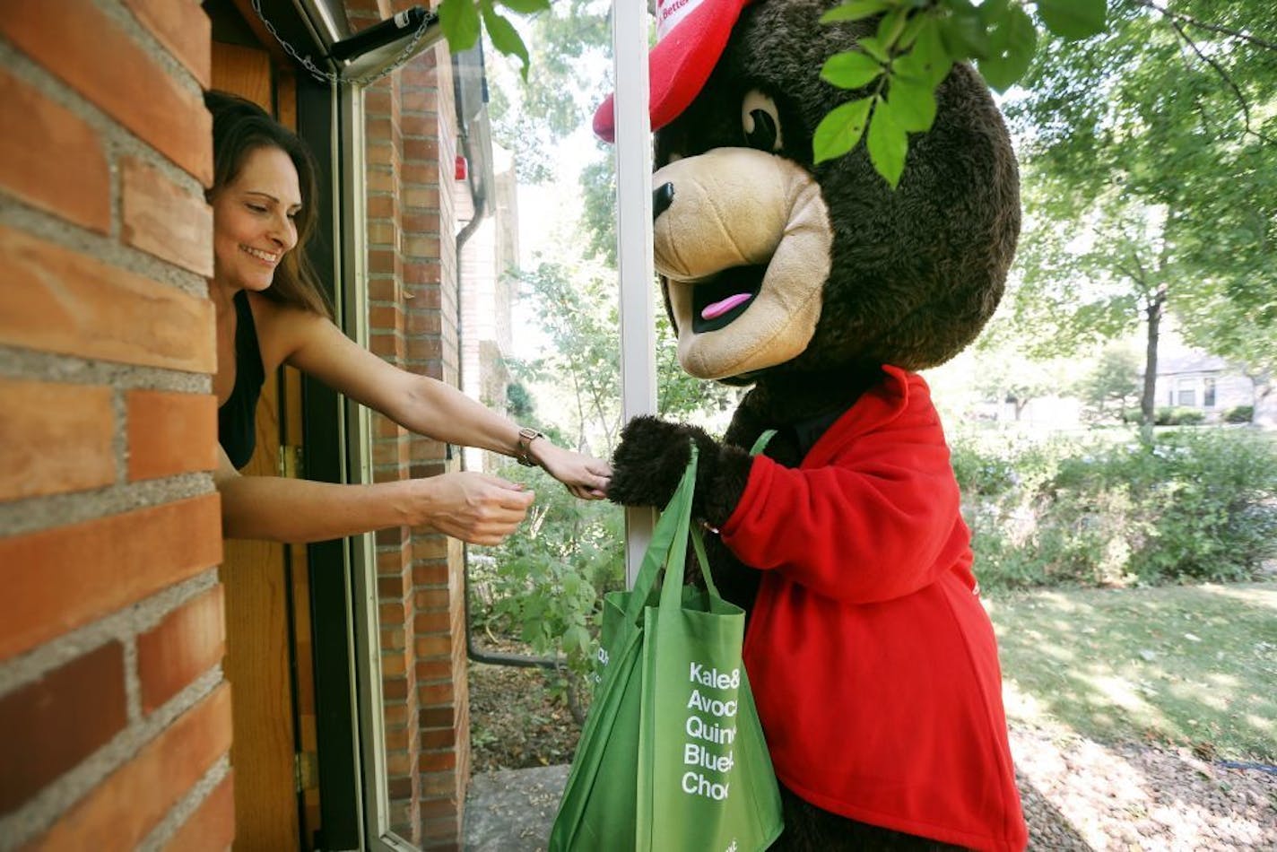 The Cub bear delivered bags of groceries via Instacart in 2015.