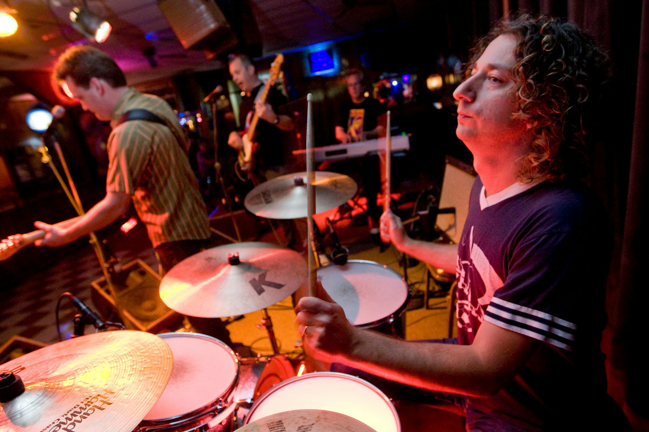 Local Band Trailer Trash on the stage at Lee's Liquor Lounge last Thursday. Band member Noah Levy Keeps the beat.