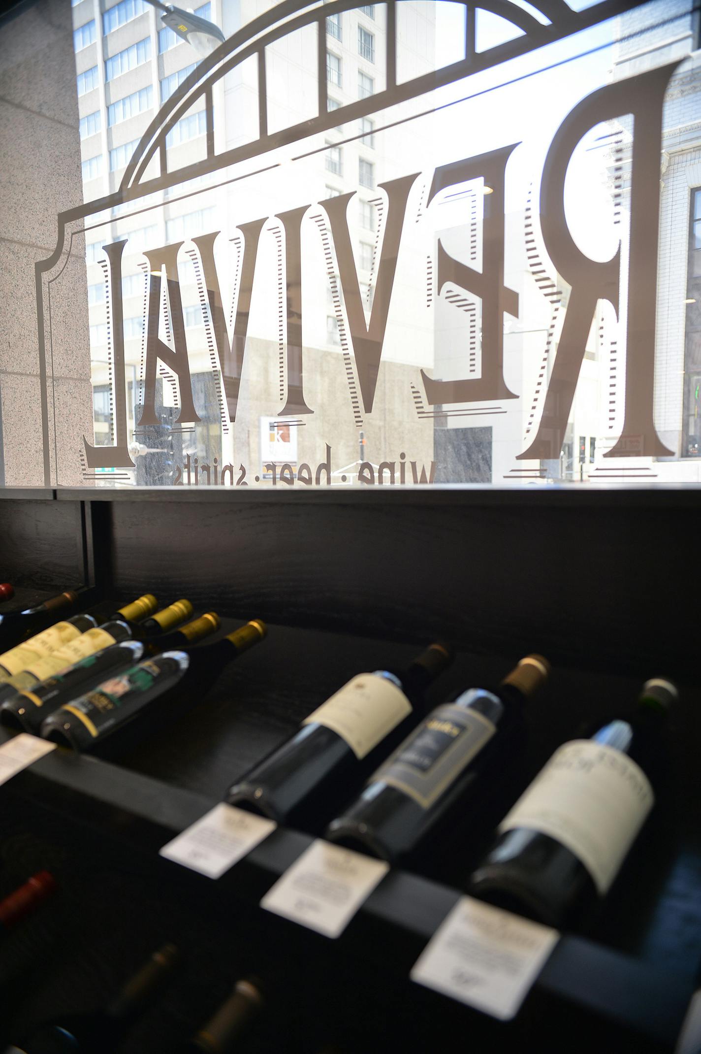 Wine Revival's downtown St. Paul skyway location and huge selection makes it easy to find the perfect bottle after a long day at the office. ] (SPECIAL TO THE STAR TRIBUNE/BRE McGEE) **Wine Revival